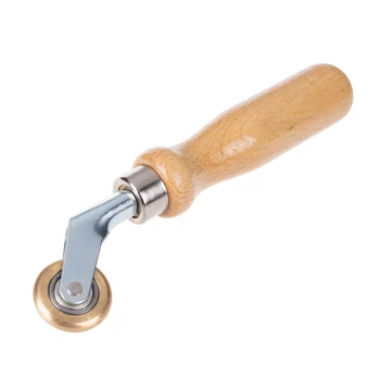 Lenyomógörgő domború, réz